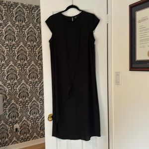 Women’s long dress with a slit down the front. Cap sleeve.